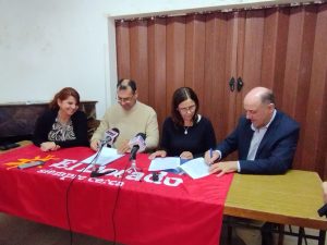 Firma del acuerdo por la campaña Un peso suma