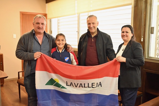 Bandera a Anggelina Rodriguez